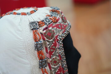 Almaty, Kazakhstan - 09.24.2021 : Traditional embroidery on the Kazakh national dress.