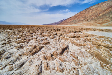 Textured detail of salt rock formations at Badwater Basin in Death Valley