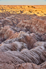 Sunrise sweeping across Badlands of South Dakota