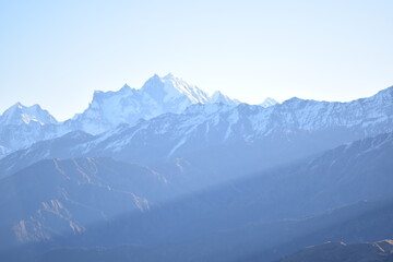 Fototapeta na wymiar The sun rays on the mountains, snow on the mountain, Kedarkantha, Uttarakhand, Shoot date - 21 Nov'21