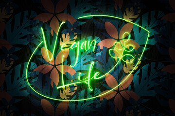 Vegan Life Neon Sign on a Dark Wooden Wall with flowers