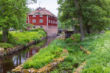 Obraz premium Old water mill with a canal