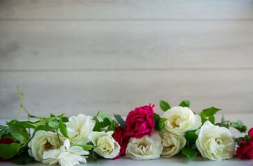 background of many white and red on a light wooden