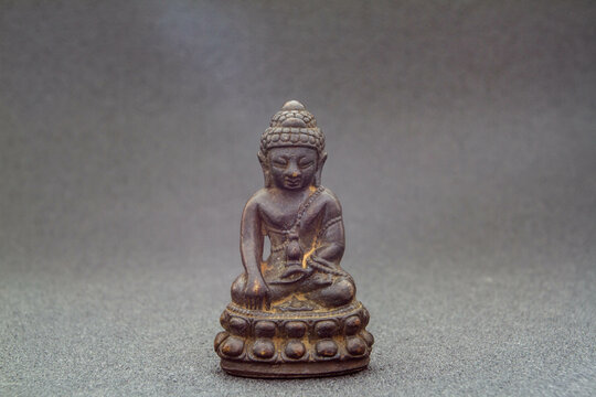Mindfulness front view of Buddha image, statue, amulet for Buddhism wallpaper or background