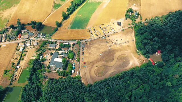 Autocross sporting events. The sports cars racing. Traditional rally .The racing car drives into a steep turn, scattering, spraying dirt, dust. Extreme rally. Aerial view