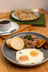 Gallo pinto costa rica traditional breakfast with black coffee and tortillas