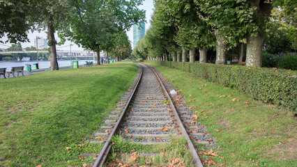 Fototapeta premium Railway tracks next to the Main river (Frankfurt am Main).