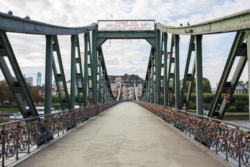 Standing on the most famous bridge of Frankfurt: The 