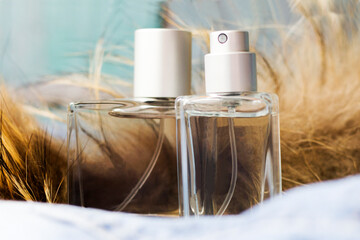 Transparent perfume bottles and fur