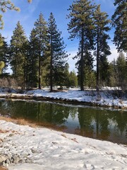 The view of Truckee river on a sunny winter day in North Lake Tahoe, California. Mountain river in Sierras. West coast vacation destinations. California roadtrip. 