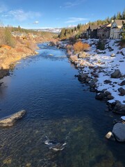 The view of Truckee river on a sunny winter day in North Lake Tahoe, California. Mountain river in...