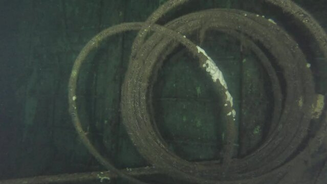Scuba Divers Swims On The Shipwreck Swedish Ferry Zenobia. Wreck Diving in Larnaca, Cyprus.