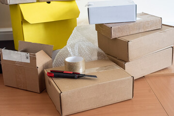 a pile of packing box on the desk in the dispatch office
