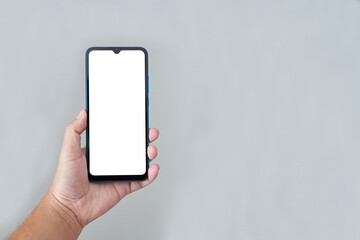 Mobile phone. Smartphone with blank screen and modern frame isolated on gray background.