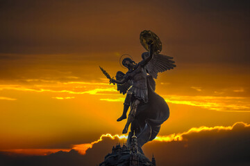 Fototapeta premium Fountain with a sculpture of Archangel Michael in the park Volodymyr Hill in Kyiv, Ukraine
