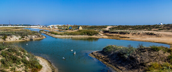 Obraz premium a shallow salty lagoon near the Azov sea on the Arabat Spit, Ukraine