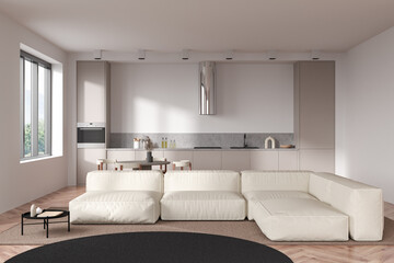 Light kitchen interior with couch and eating area, panoramic window