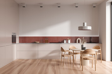 Light kitchen interior with eating table and seats, shelves and kitchenware