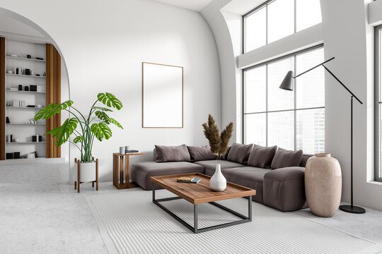 Light living room interior with couch, shelf and panoramic window, mockup frame