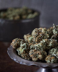 Cannabis buds dried and trimmed. Marijuana buds photographed in natural light. Close up with lots of detail. 