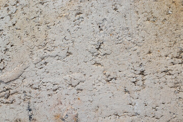Gray scratched stone surface. Texture background.