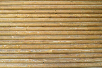 Shield with a large number of parallel wooden logs texture