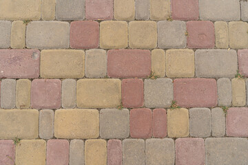 Perspective view of a monotonous stone pavement on the ground for a street road. Pavement,...