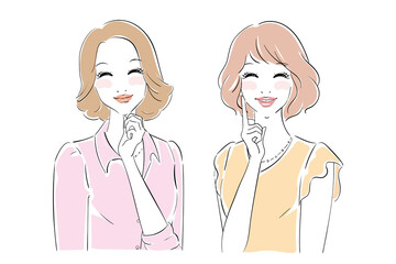Fototapeta premium 微笑む二人のきれいな女性