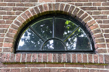 Den Helder, Netherlands, May 2022. Close up of traditional windows in an old Dutch farmhouse. .