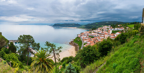 Panoramic view of Lastres and El Escanu beach from the San Roque viewpoint, Asturias.