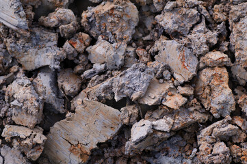 a large pile of dug up soil. Soil texture close up.