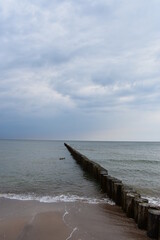 Obraz premium Ostsee - Polen - Strand - Sonnenuntergang - Möven - Wasser