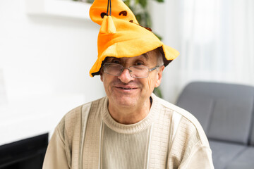 old man headshot celebrating halloween at home