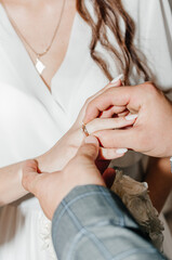 Obraz na płótnie Canvas male and female hand with wedding rings