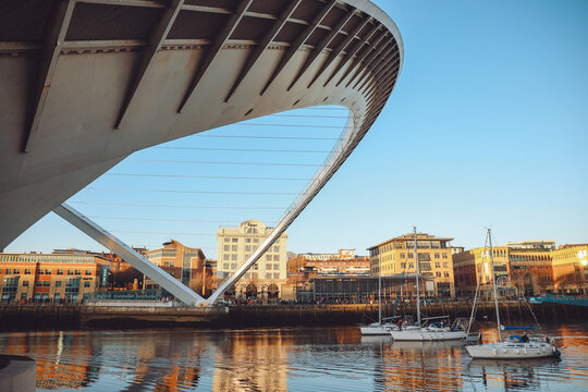 Newcastle upon Tyne/UK - 31st Dec 2019: three yachts sailing under the Millennium Bridge on River Tyne