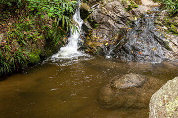 Photo of beautiful nature waterfall in forest.