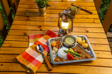 キャンプでカレーライス  Typical camping food, curry and rice