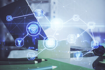 Computer on desktop with social network theme icon. Multi exposure. Concept of international connections.