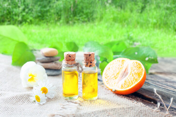 Orange oil - essential oil in a glass jar