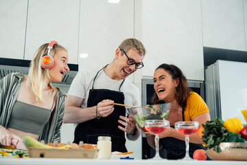 Happy family cooking together on kitchen with kids, Home recreation and food preparation on weekend.