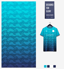 Soccer jersey pattern design. Snake pattern on gradient blue background for soccer kit, football kit or sports uniform. T-shirt mockup template. Fabric pattern. Abstract background. 