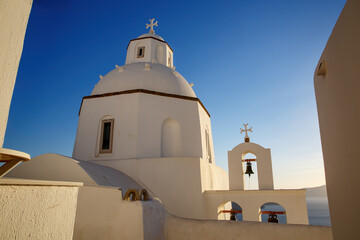 Santorini architecture with traditional Greek white buildings. - obrazy, fototapety, plakaty