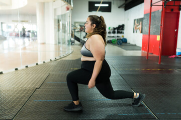 Young fat woman working out