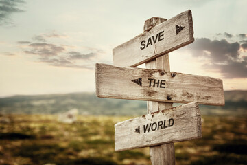save the world text quote caption on wooden signpost outdoors in nature. Stock sign words theme.