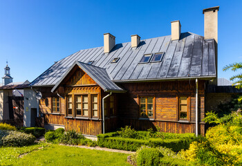 Reconstructed wooden country house aside St. Catherine Benedictine convent in Swieta Katarzyna...