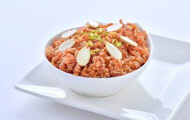 Gajar Halwa or Carrot Pudding. A delicious sweet and healthy dessert prepared by pure milk, desi ghee and fresh carrots.