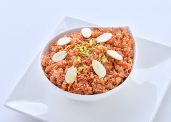Gajar Halwa or Carrot Pudding. A delicious sweet and healthy dessert prepared by pure milk, desi ghee and fresh carrots.