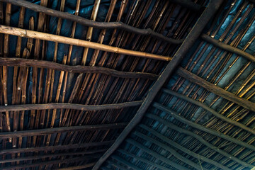 A shot of a wooden roof from inside of a tribal home in rural India. Uttarakhand India.
