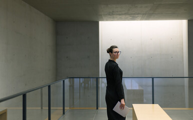 Businesswoman portrait in minimalist office workspace