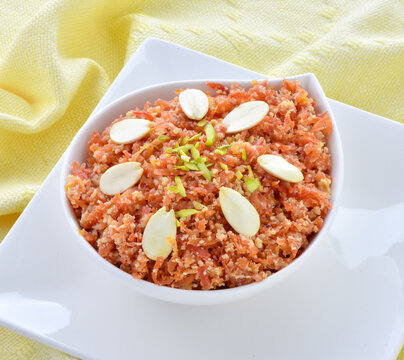 Gajar Halwa or Carrot Pudding. A delicious sweet and healthy dessert prepared by pure milk, desi ghee and fresh carrots.